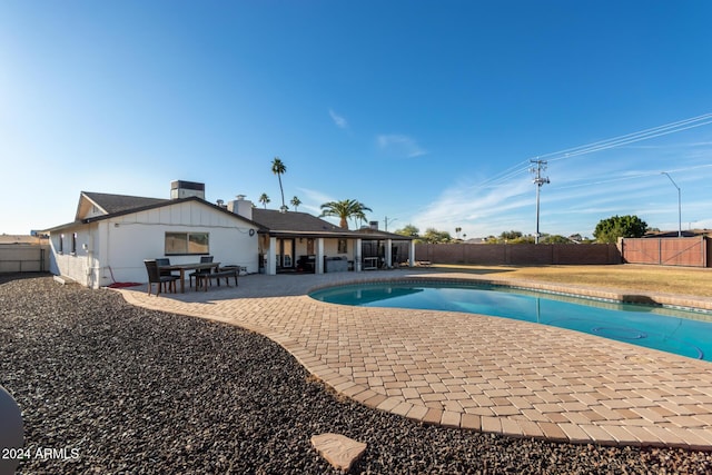 12043 N 46th Ave, Glendale, AZ 85304 - view of pool with a patio and a fenced backyard