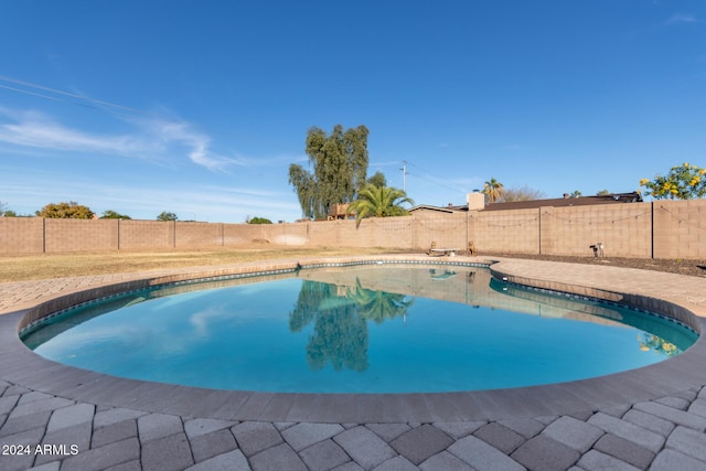 12043 N 46th Ave, Glendale, AZ 85304 - view of swimming pool with a fenced backyard