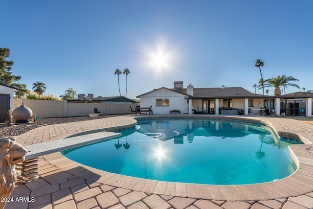 12043 N 46th Ave, Glendale, AZ 85304 - view of pool featuring a patio area, a fenced backyard, and a diving board