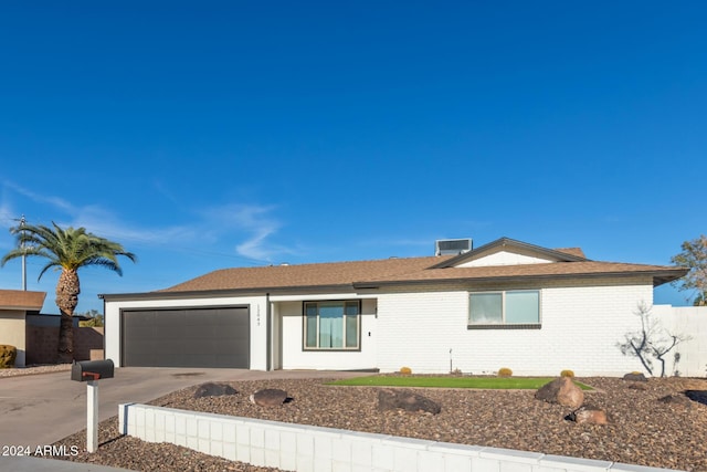 12043 N 46th Ave, Glendale, AZ 85304 - single story home featuring driveway, an attached garage, cooling unit, and roof with shingles
