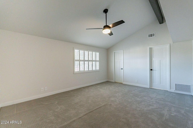 carpeted spare room featuring high vaulted ceiling, ceiling fan, and beamed ceiling