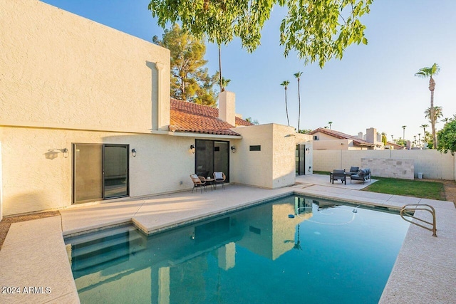 view of pool with a patio