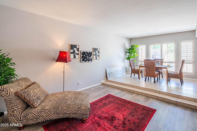 11025 N 10th St, Phoenix, AZ 85020 - living room with wood finished floors and baseboards
