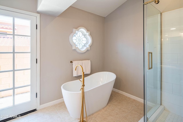 11025 N 10th St, Phoenix, AZ 85020 - full bathroom with a stall shower, a soaking tub, and plenty of natural light