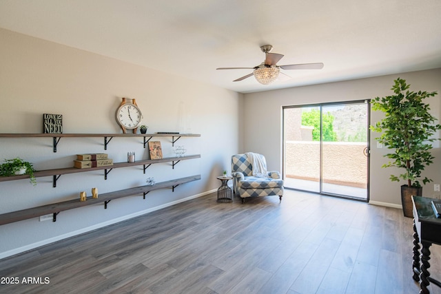 11025 N 10th St, Phoenix, AZ 85020 - living area featuring a ceiling fan and wood finished floors