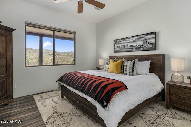 bedroom featuring ceiling fan and wood finished floors