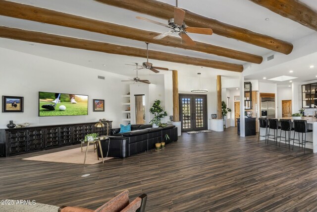 living area with visible vents, dark wood-style flooring, french doors, beam ceiling, and recessed lighting