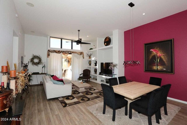 dining area with hardwood / wood-style flooring