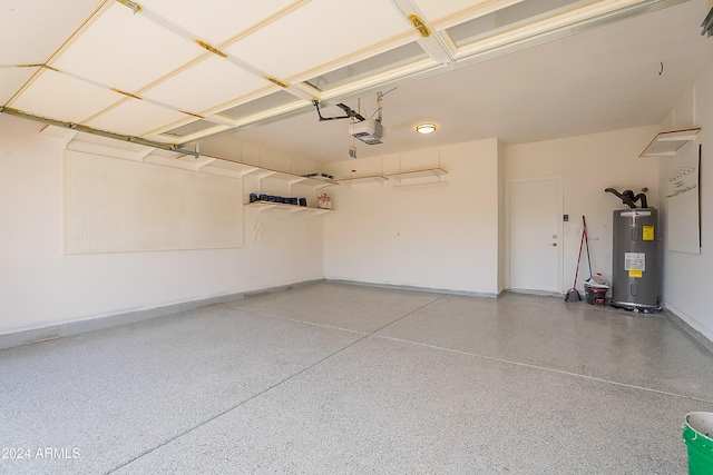 garage with electric water heater and a garage door opener