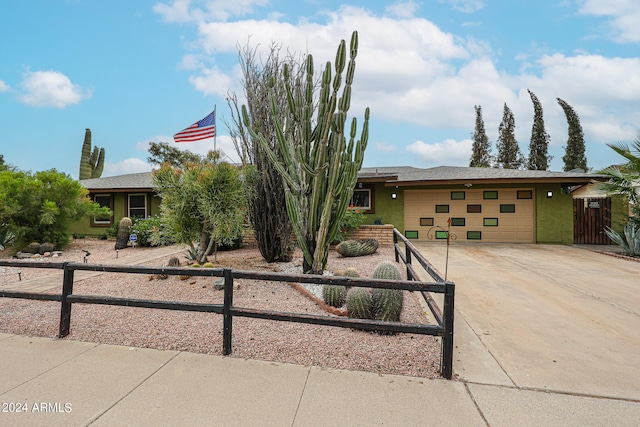 view of front of property featuring a garage