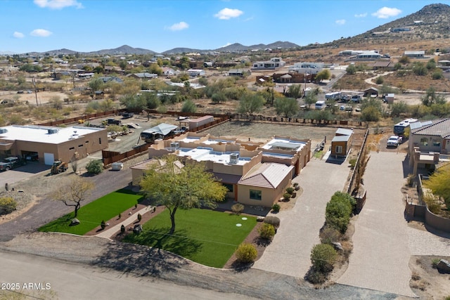 bird's eye view with a residential view and a mountain view