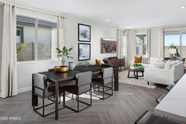 dining area featuring recessed lighting and baseboards