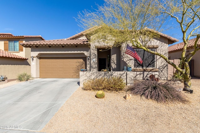 view of front of house featuring a garage, driveway, a tiled roof, and stucco siding