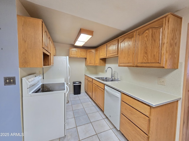 4950 Raffaele Dr, Sierra Vista, AZ 85635 - kitchen with white appliances, a sink, light tile patterned floors, and light countertops