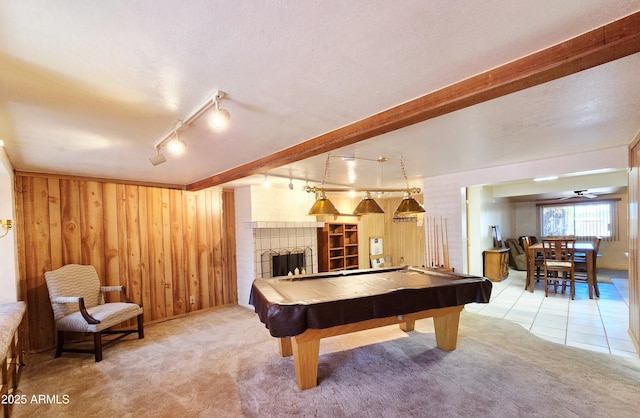 4950 Raffaele Dr, Sierra Vista, AZ 85635 - recreation room with light carpet, rail lighting, wooden walls, billiards, and a fireplace