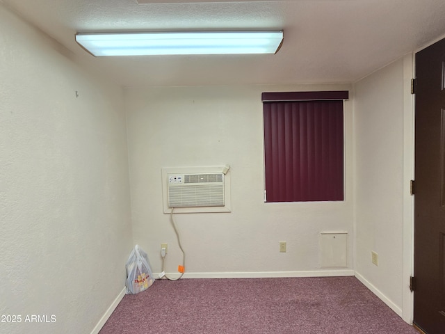 4950 Raffaele Dr, Sierra Vista, AZ 85635 - unfurnished room with carpet floors, an AC wall unit, and baseboards