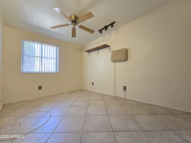4950 Raffaele Dr, Sierra Vista, AZ 85635 - spare room with light tile patterned floors, ceiling fan, and track lighting