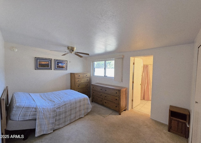 4950 Raffaele Dr, Sierra Vista, AZ 85635 - bedroom featuring light carpet, a ceiling fan, and a textured ceiling