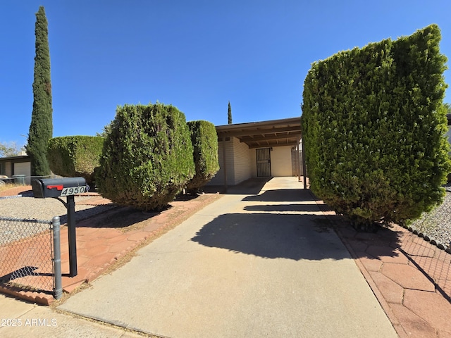 4950 Raffaele Dr, Sierra Vista, AZ 85635 - view of front of property with concrete driveway and a carport