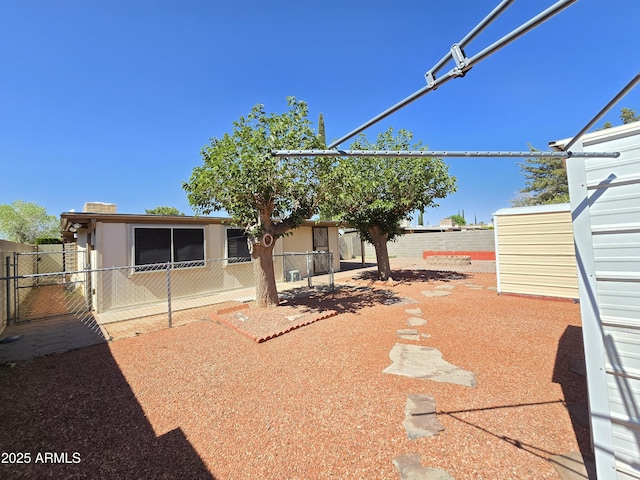 4950 Raffaele Dr, Sierra Vista, AZ 85635 - fenced backyard with a patio area
