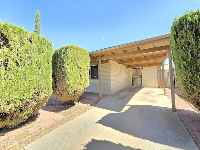 4950 Raffaele Dr, Sierra Vista, AZ 85635 - view of patio / terrace with concrete driveway and a carport