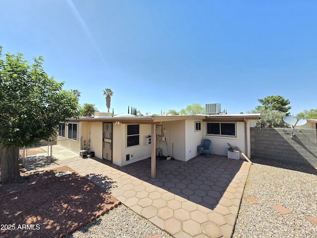 4950 Raffaele Dr, Sierra Vista, AZ 85635 - rear view of property featuring cooling unit, a patio, and a gate