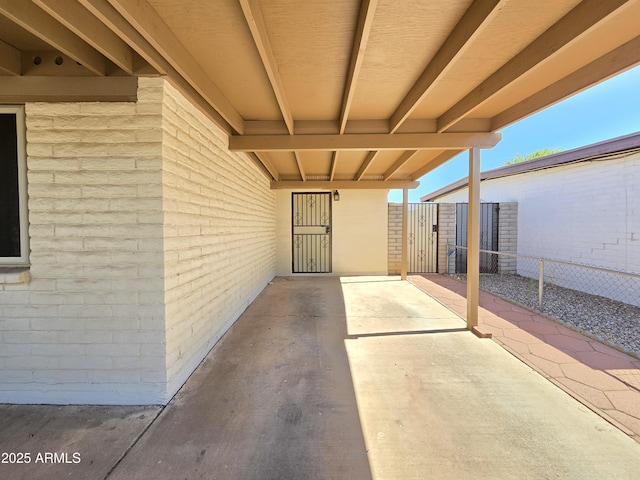 4950 Raffaele Dr, Sierra Vista, AZ 85635 - view of exterior entry featuring brick siding and a patio area