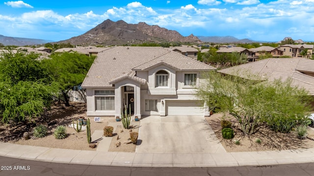 6026 E Sonoran Trl, Scottsdale, AZ 85266 - view of front of house with a garage, stucco siding, driveway, a mountain view, and a tile roof