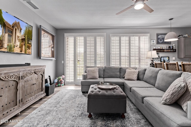 6026 E Sonoran Trl, Scottsdale, AZ 85266 - living room with wood finished floors and ceiling fan