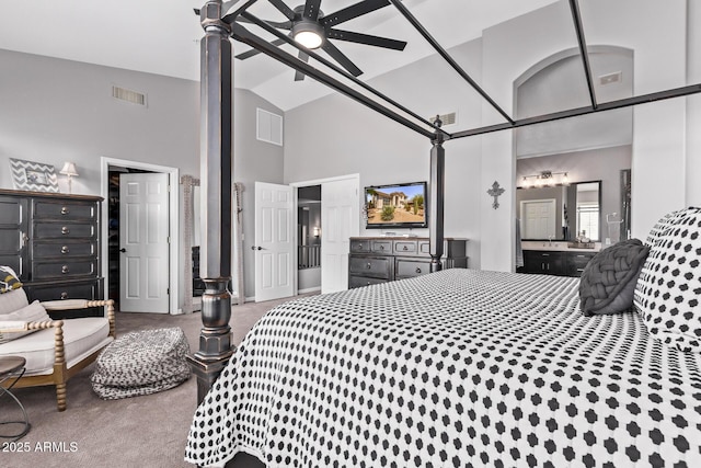 6026 E Sonoran Trl, Scottsdale, AZ 85266 - carpeted bedroom with high vaulted ceiling, ensuite bathroom, and ceiling fan