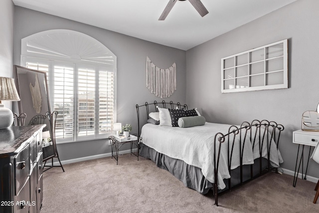 6026 E Sonoran Trl, Scottsdale, AZ 85266 - carpeted bedroom with baseboards and ceiling fan