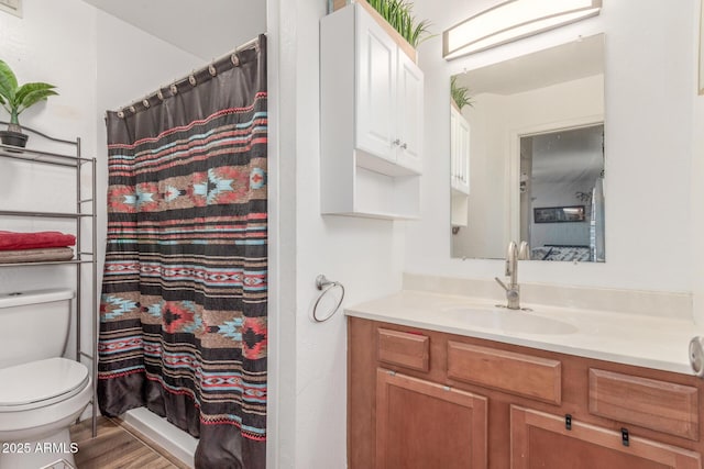 16602 N 25th St Unit 204, Phoenix, AZ 85032 - full bathroom with toilet, vanity, curtained shower, and wood finished floors