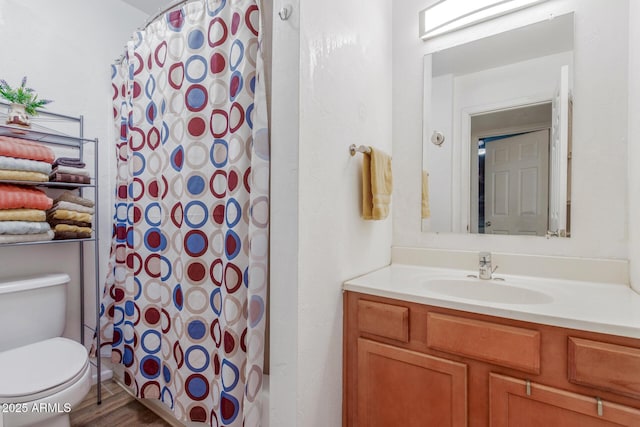 16602 N 25th St Unit 204, Phoenix, AZ 85032 - bathroom featuring vanity, toilet, wood finished floors, and shower / bath combo with shower curtain
