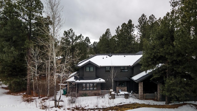 2100 Aubry, Flagstaff, AZ 86005 - snow covered rear of property featuring stone siding