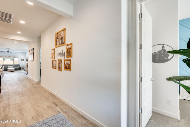 hallway with light wood-type flooring