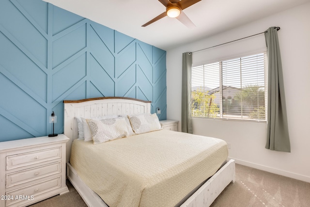 bedroom with ceiling fan and carpet flooring