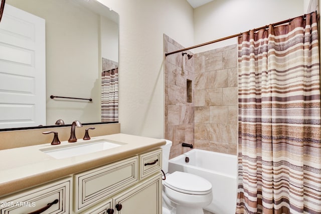 full bathroom featuring shower / bathtub combination with curtain, vanity, and toilet