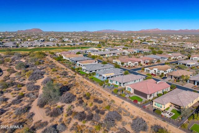 drone / aerial view featuring a mountain view