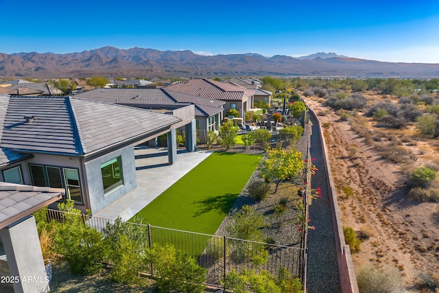 drone / aerial view featuring a mountain view