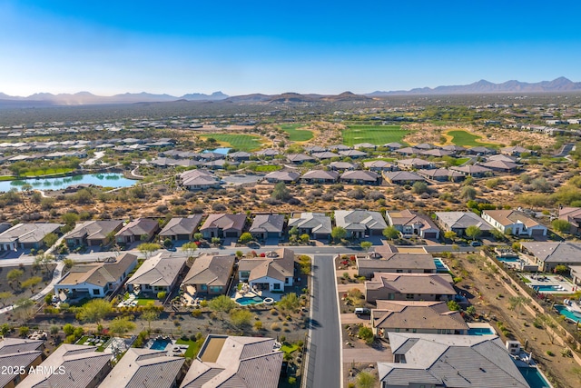 bird's eye view featuring a water and mountain view