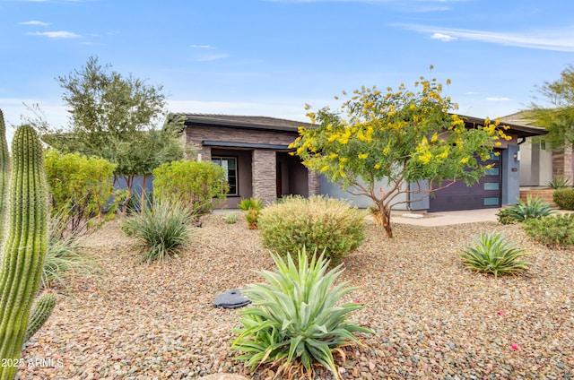 view of front of home with a garage