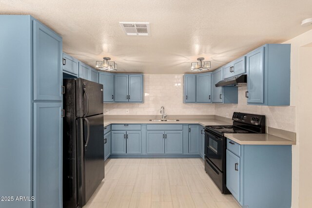 2721 W Luke Ave, Phoenix, AZ 85017 - kitchen featuring black appliances, blue cabinets, under cabinet range hood, a sink, and a chandelier