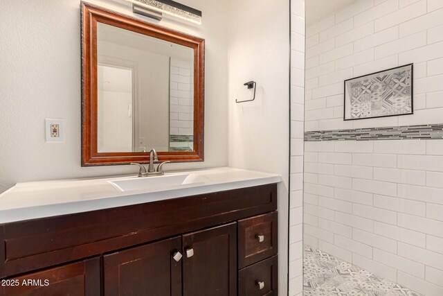 2721 W Luke Ave, Phoenix, AZ 85017 - bathroom featuring vanity and a tile shower