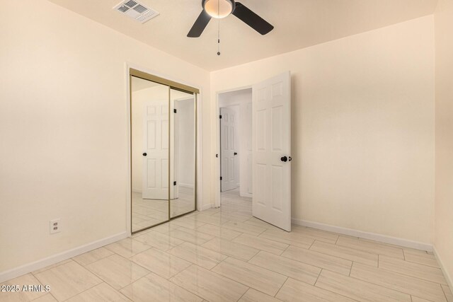 2721 W Luke Ave, Phoenix, AZ 85017 - unfurnished bedroom featuring a closet, baseboards, and ceiling fan