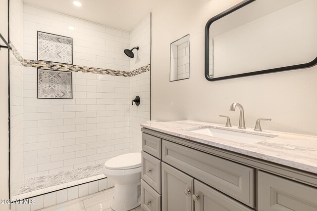 2721 W Luke Ave, Phoenix, AZ 85017 - full bath with toilet, vanity, a tile shower, and recessed lighting