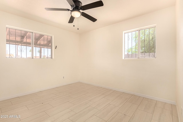 2721 W Luke Ave, Phoenix, AZ 85017 - empty room with baseboards and ceiling fan