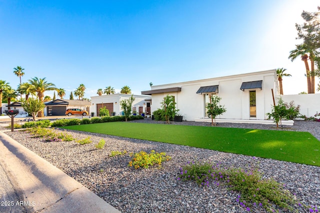 675 Val Verde Cir W, Litchfield Park, AZ 85340 - view of front facade with stucco siding