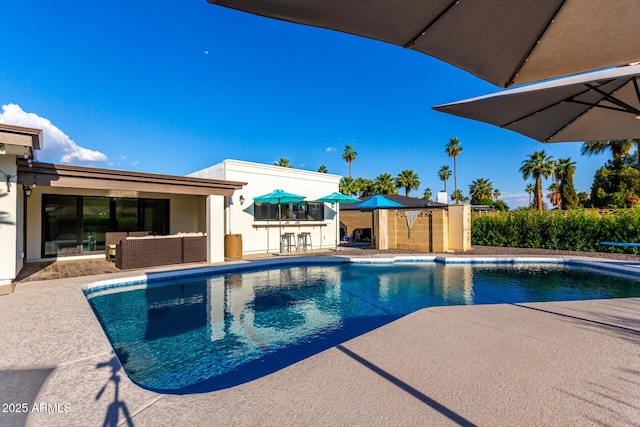 675 Val Verde Cir W, Litchfield Park, AZ 85340 - swimming pool featuring a patio area and an outdoor hangout area