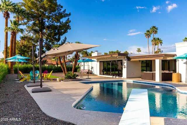 675 Val Verde Cir W, Litchfield Park, AZ 85340 - outdoor pool featuring a patio and a diving board