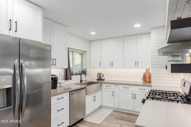 675 Val Verde Cir W, Litchfield Park, AZ 85340 - kitchen with appliances with stainless steel finishes, a sink, white cabinetry, and recessed lighting